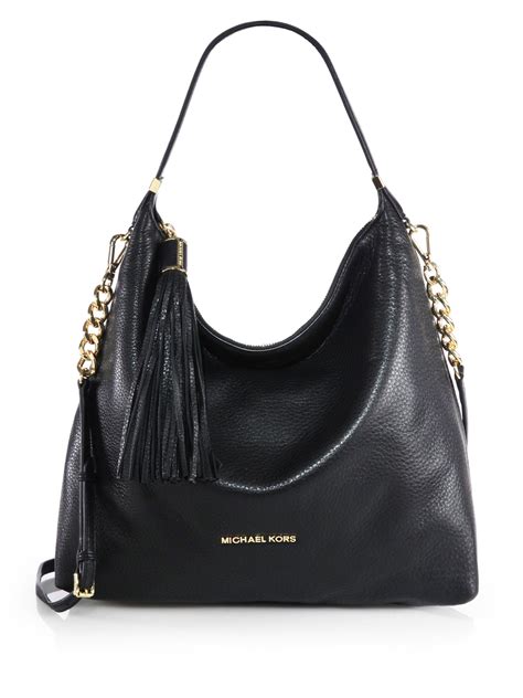 black michael kors handbags|vintage michael kors black handbags.